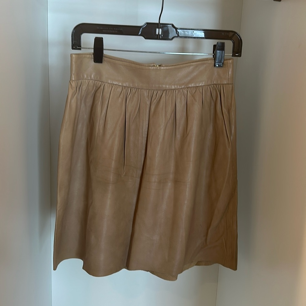 Alice + Olivia, leather beige skirt with silk lining.
